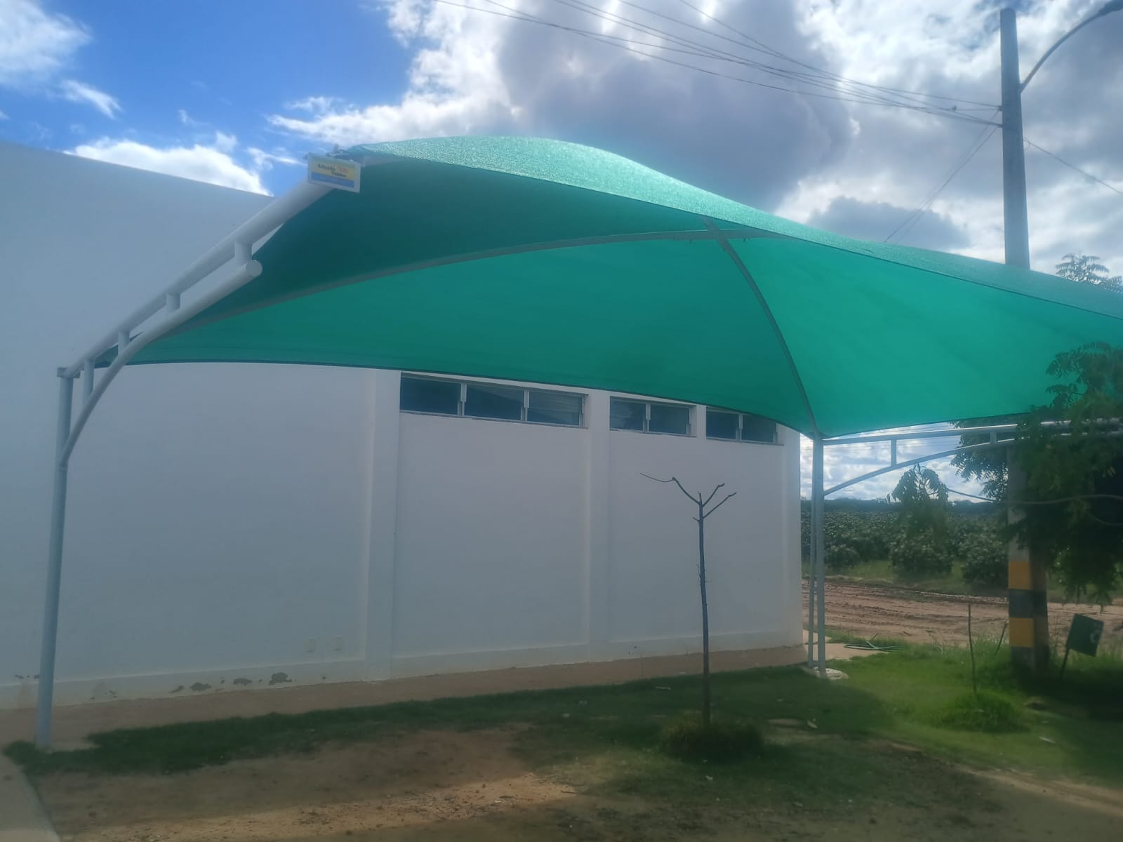 Toldo tensionado verde